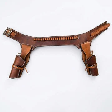 Cinturón Western de cuero marrón con dos fundas para revólver y trabillas para cartuchos