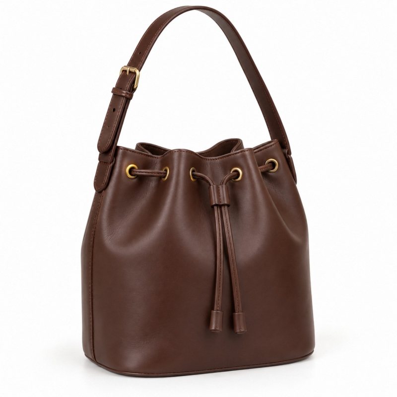 Bolso bombonera de piel con base estructurada - Frontal con cordón y correa